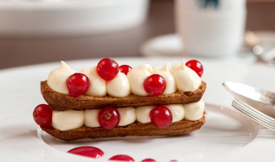 Fine dessert with cream and red berries, lovingly prepared at the Hotel Elephant Weimar.